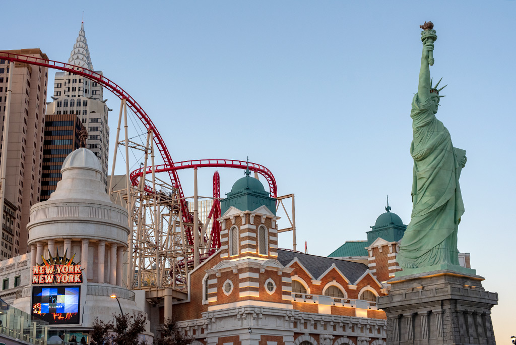 new york, new york hotel in las vegas with replica of statue of liberty at the fron to the hotel.