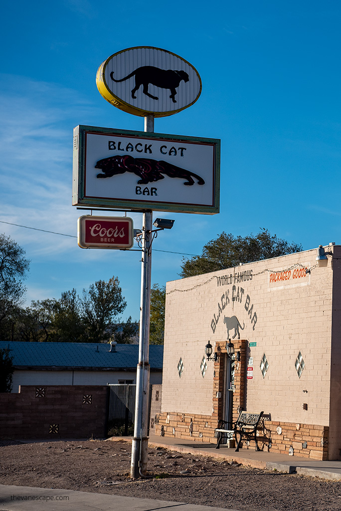 Best Route 66 Towns Arizona: the entrance to the black cat bar.