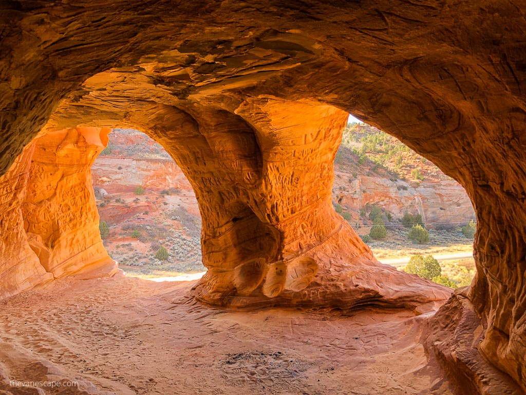 orange caves and orange walls inside of Moqui Caverns near Kanab Utah