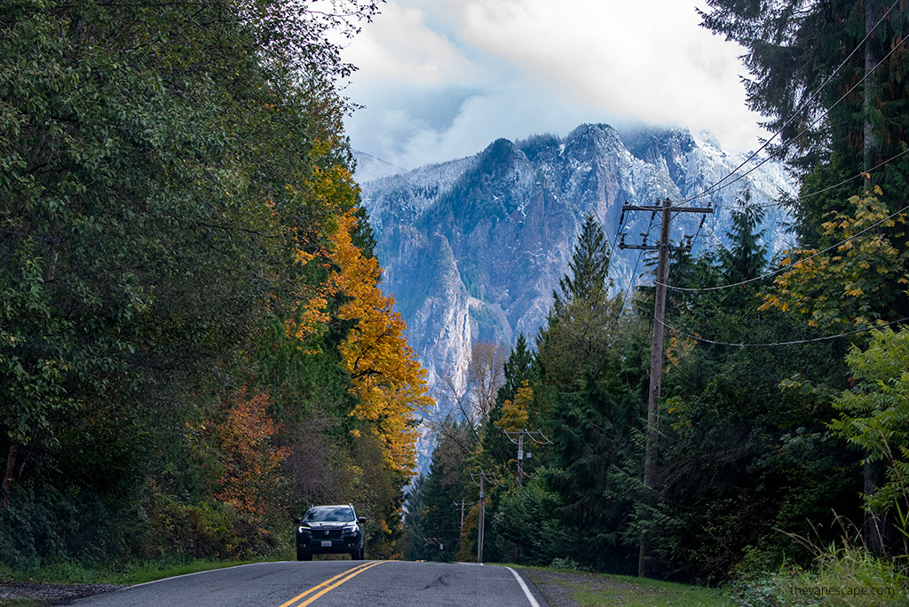 The road where used to be a Twin Peaks Sign with mountains in the backdrop.