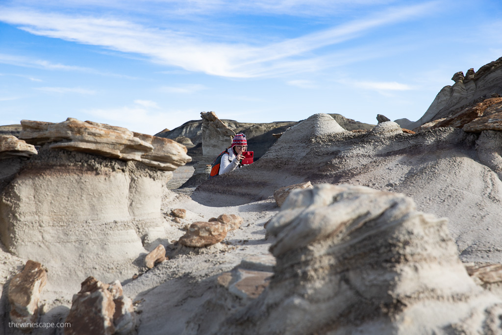 Agnes taking pictures among delicate rock formations in Bisti.