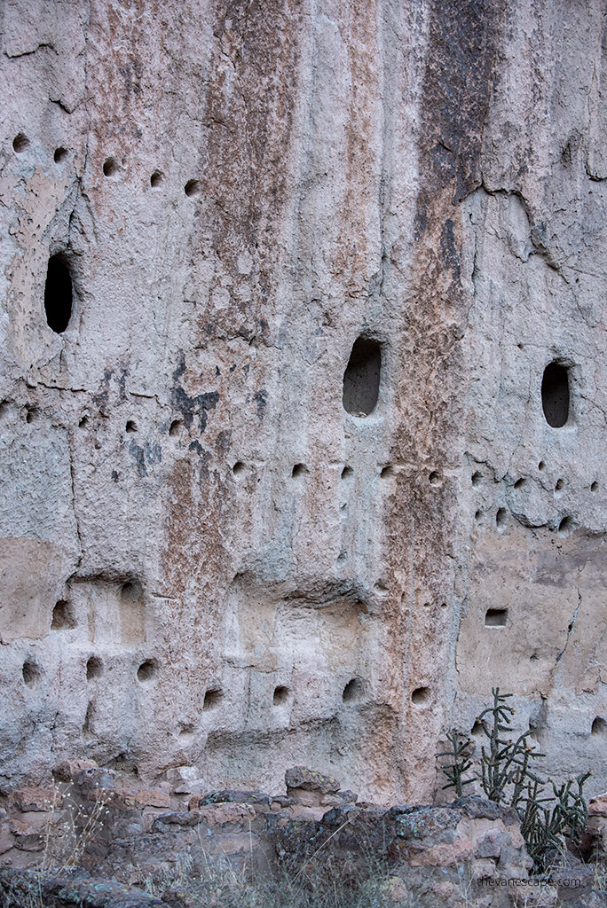 old houses in the rock walls in Bandelier National Monument