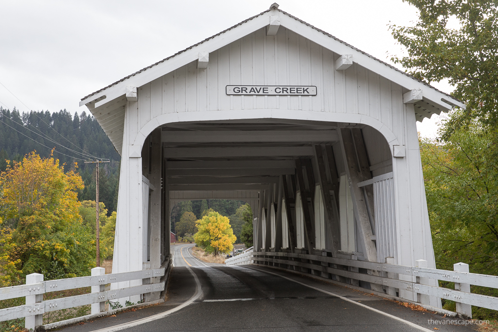 Oregon Covered Bridges -white and wooden Grave Creek bridge.