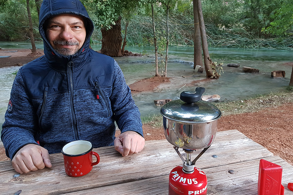 Chris Labanowski at the campground with the river in the backdrop.