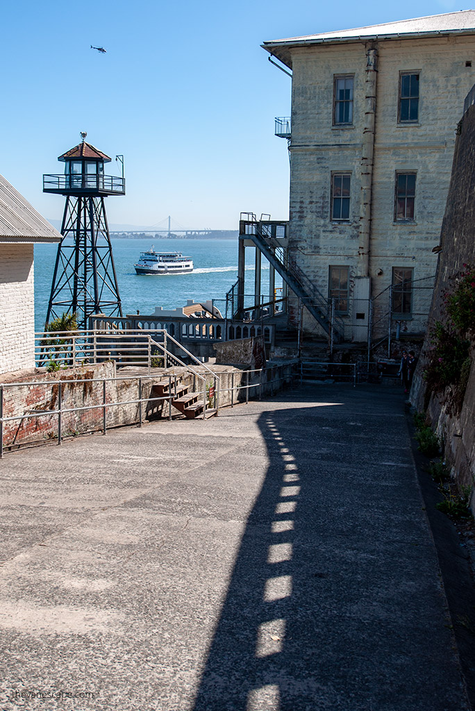 buildlings on Alcatraz Island and the ferry to Alcatraz starting mooring.