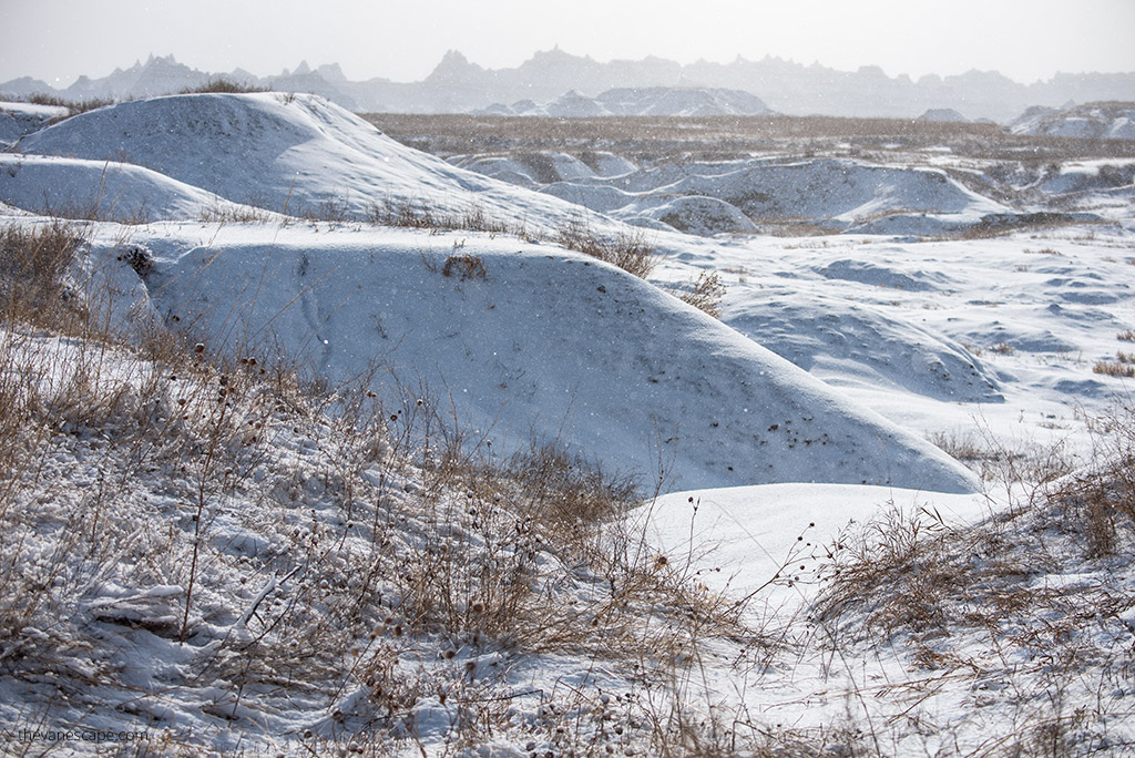 stunning winter scenery in badlands during sunny day.
