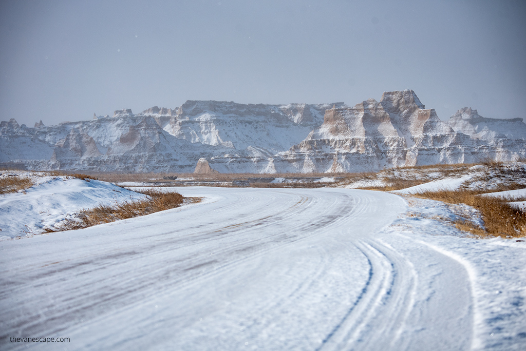 road covered by snow in Badlands National Park in Winter