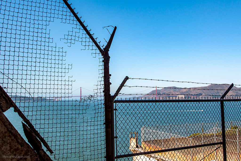 A wire fence in a prison overlooking the Golden Gate Bridge in San Francisco.