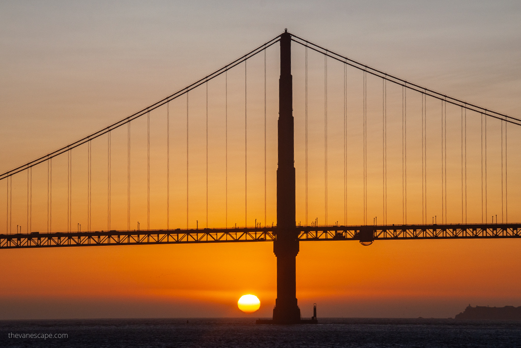 Golden Gate Bridge during sunset catamaran tour.