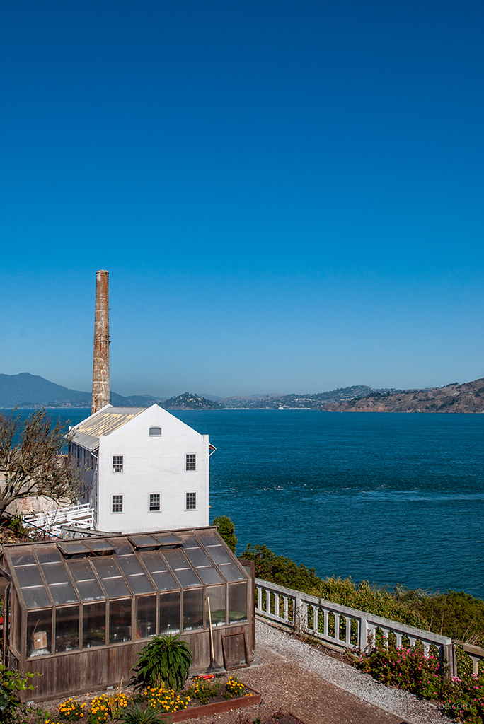 Prison buildings and blue water in San Francisco Bay