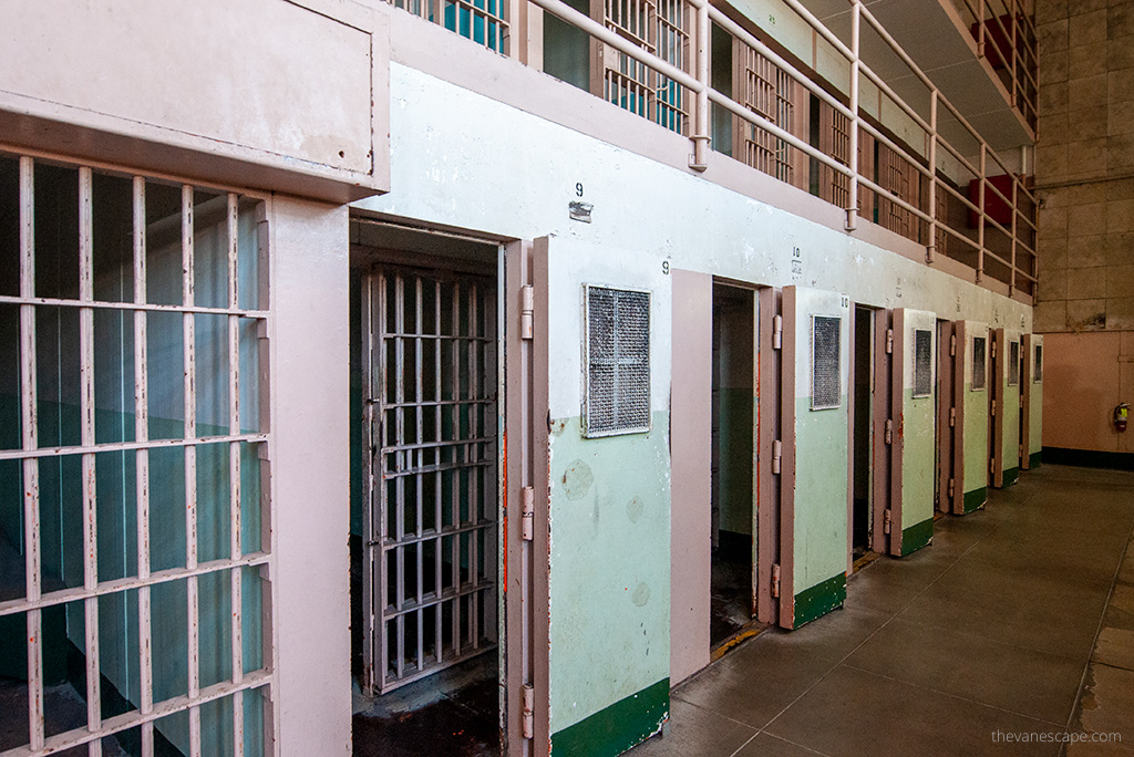 the best alcatraz tours: cells in prison and bars in the doors.