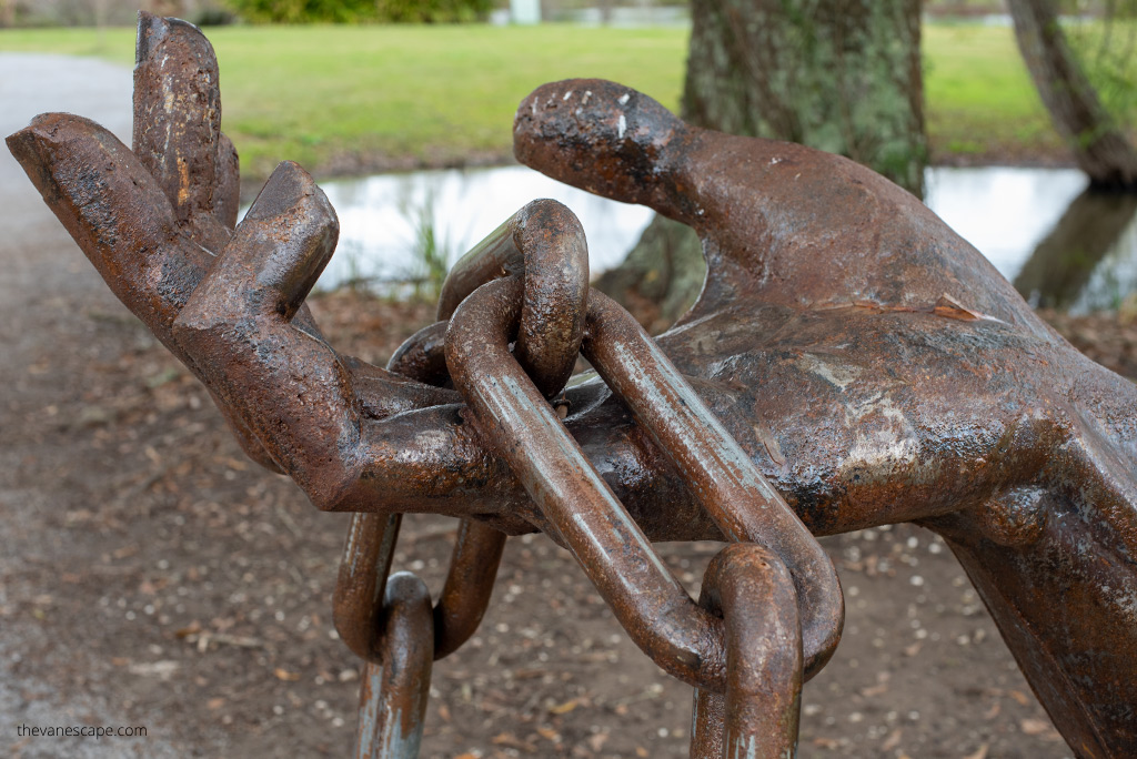 Bronze sculpture of a chain and a slave's hand at the Whitney Plantation near New Orleans. 