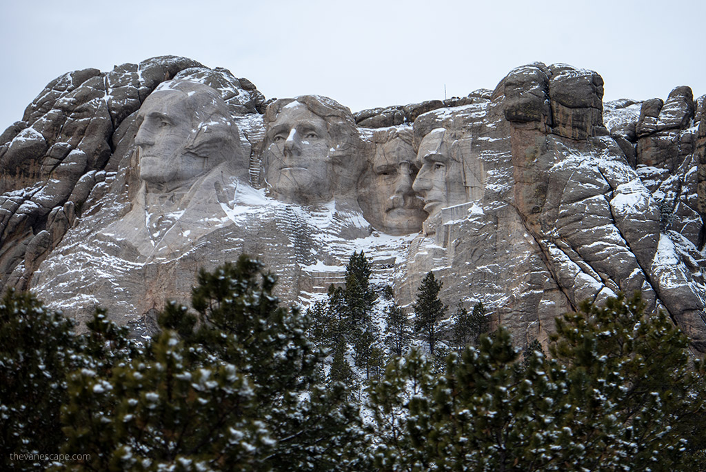 heads of 4 presidents in Mount Rushmore National Memorial.