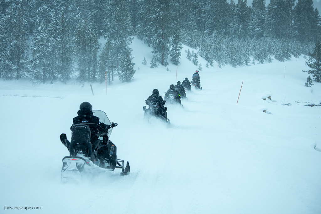 guided snowmobile tour in Yellowstone in Winter.