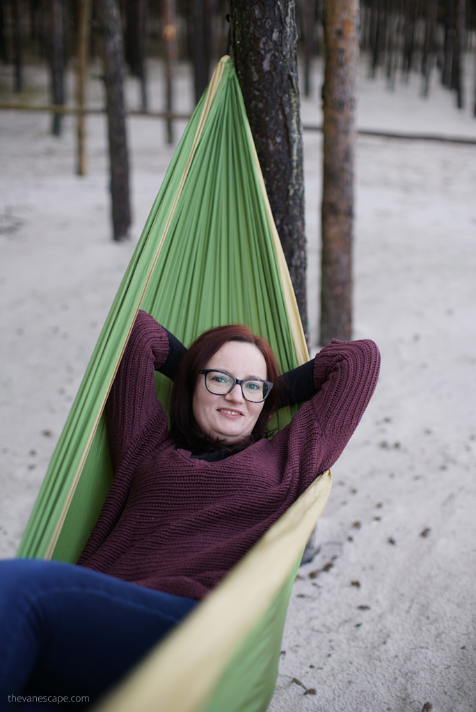 Agnes Stabinska, the author, in green backpacking Hammock