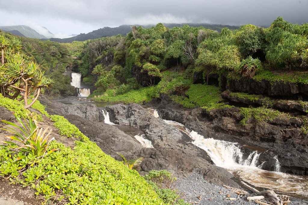 'Ohe'o Gulch on Maui among lush greenery nad jungle trees.