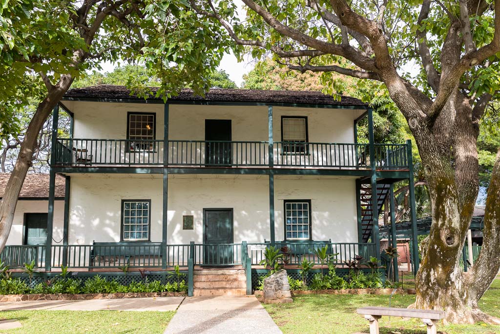 historical houses among trees on Maui.