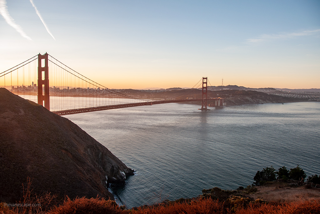 San Francisco and Golden Gate Bridge during sunset.