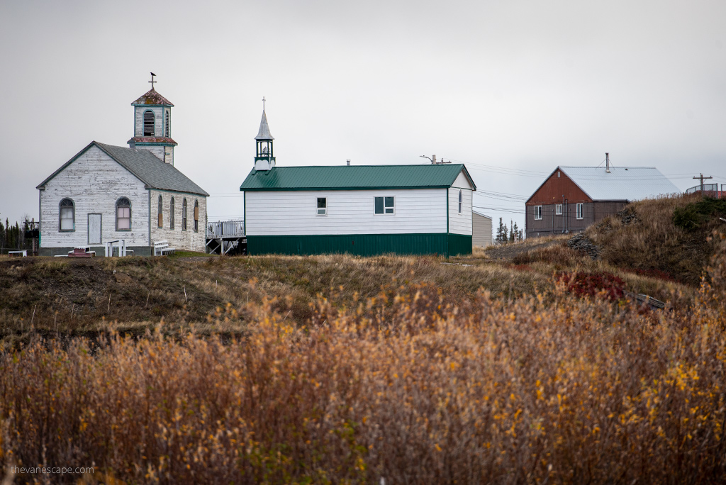 must-see stops on Dempster Highway: white church on the hill in Tsiigehtchic