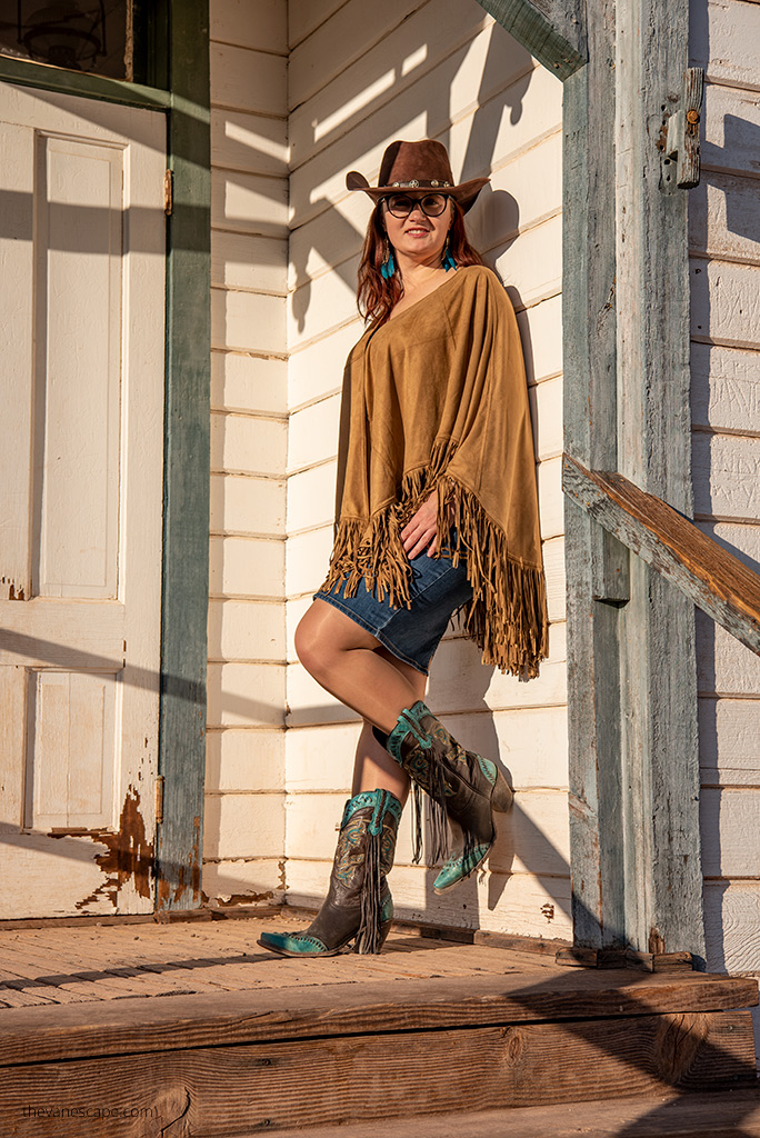 Agnes Stabinska, the author, as a cowboy girl  in cowboy boots and hat in Calico Ghost Town.