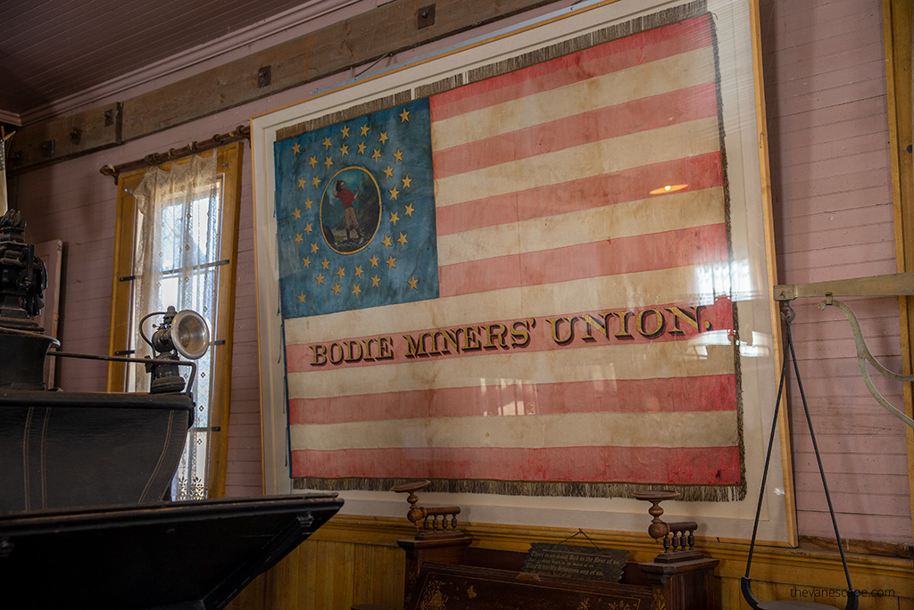 flag of the Bodie Miner's Union inside one of the old buildlings.