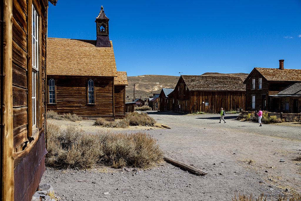 wooden buildling of the church and main street in Bodie Ghost Town.