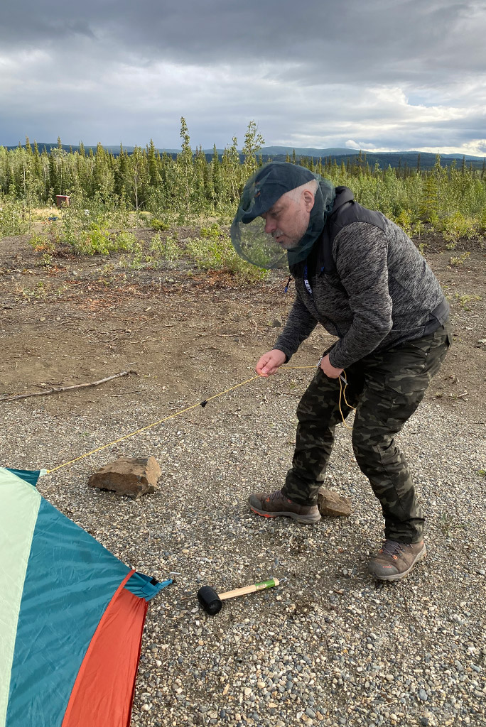 Chris in KUHL SILENCR ROGUE KARGO PANT at campsite.