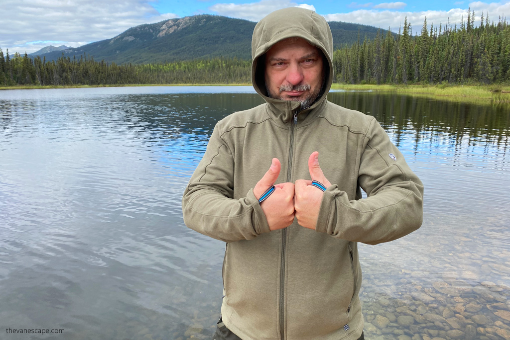 Chris Labanowski, co-founder of The Van Escape blod in KUHL SPEKTER Full Zip Hoody with the lake and forest view.