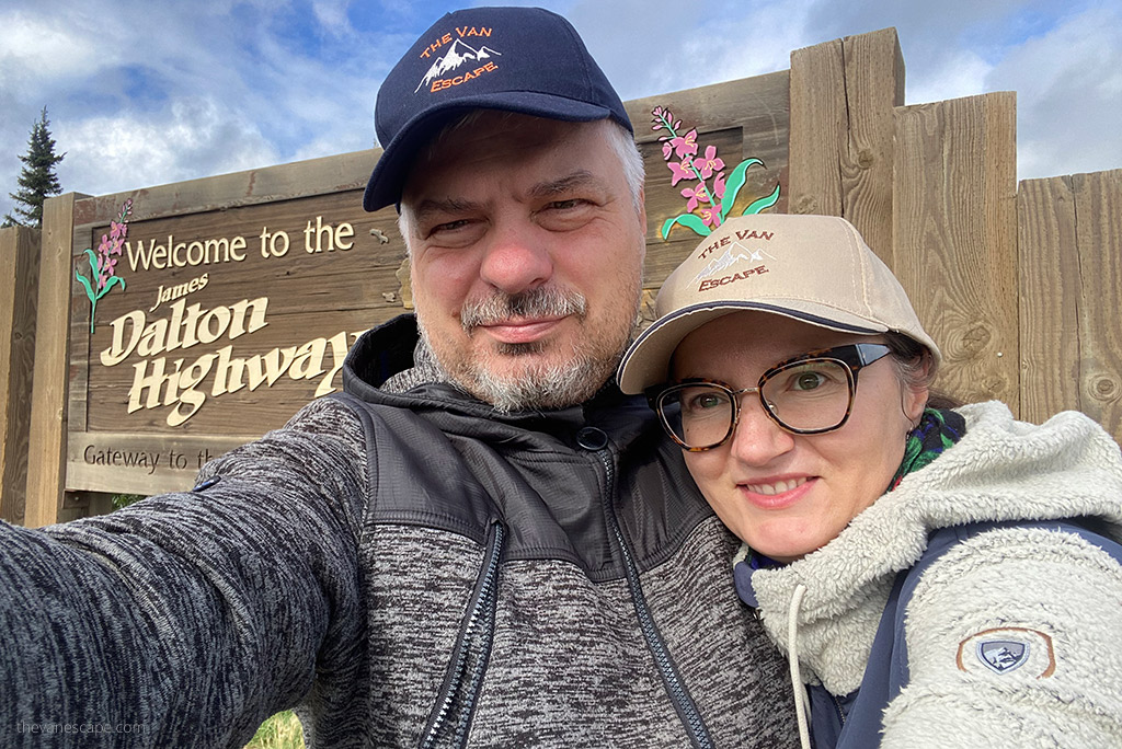 Agnes Stabisnak, the author and her partner Chris Labanowski, owners of the Van Escape blog on the Dalton Highway during alaska road trip.