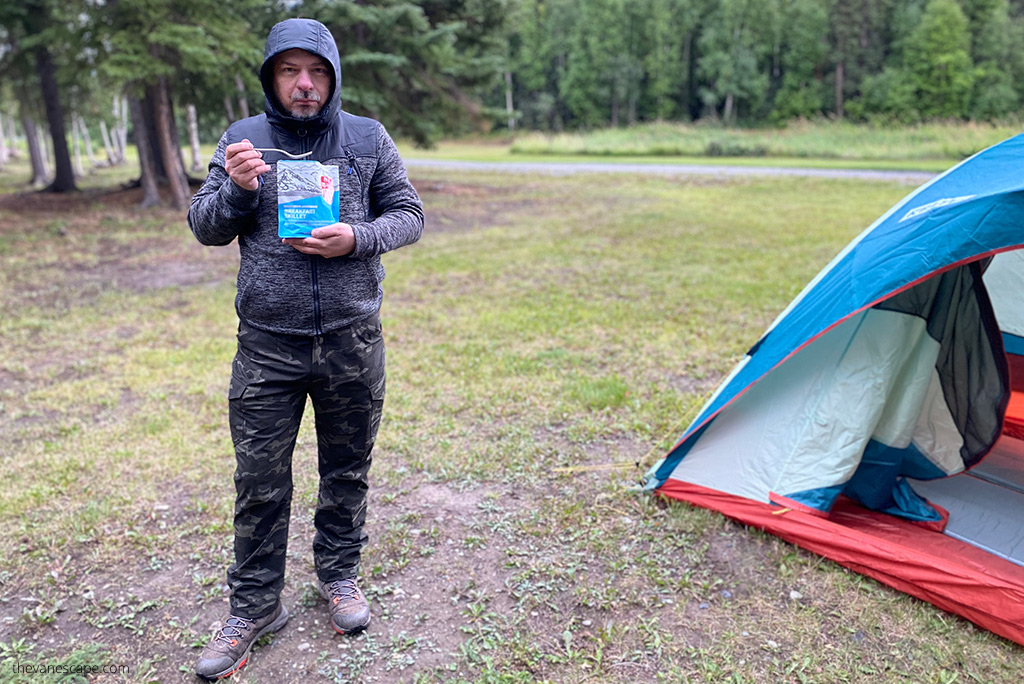 Chris Labanowski eating camping food from our day hiking packing list.