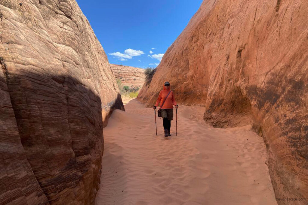 Agnes Stabinska, the author and co-owner of The Van Escape blog, is hiking to Zebra Slot Canyon in Utah