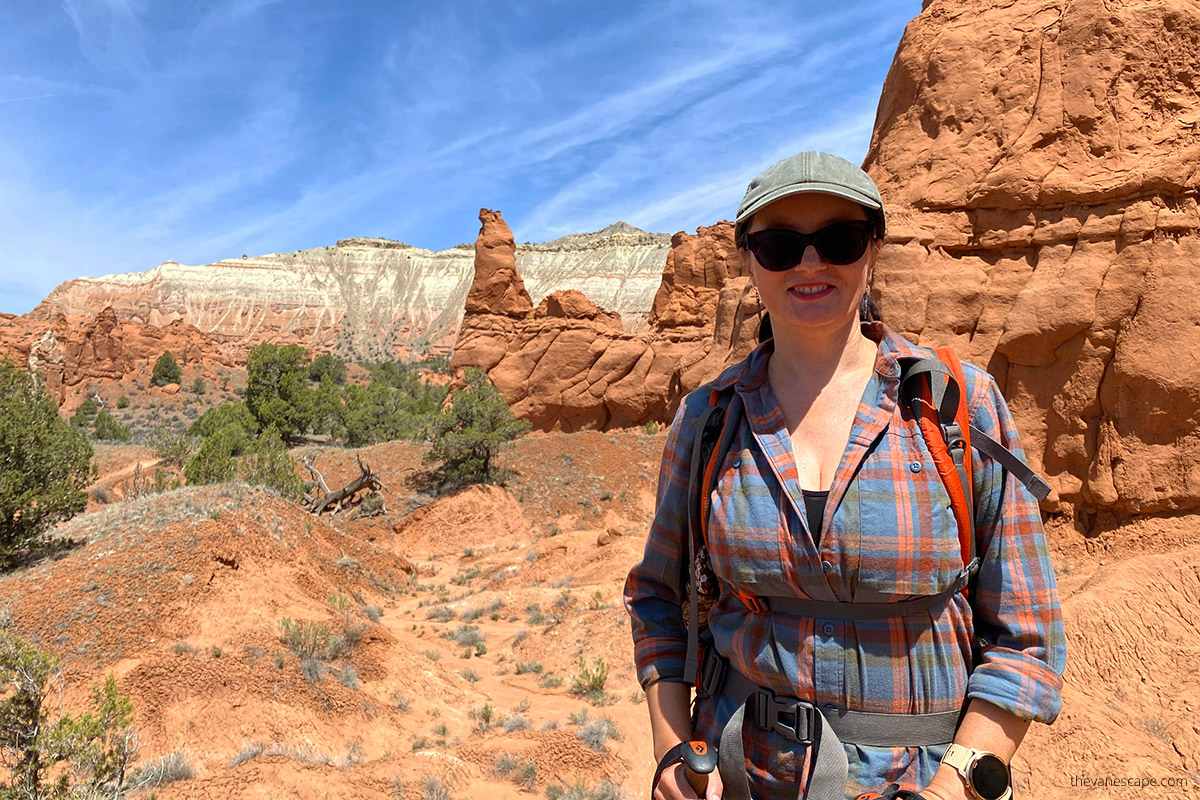 Agnes on hiking trail in Kodachrome Basin State Park among orange rock formations.