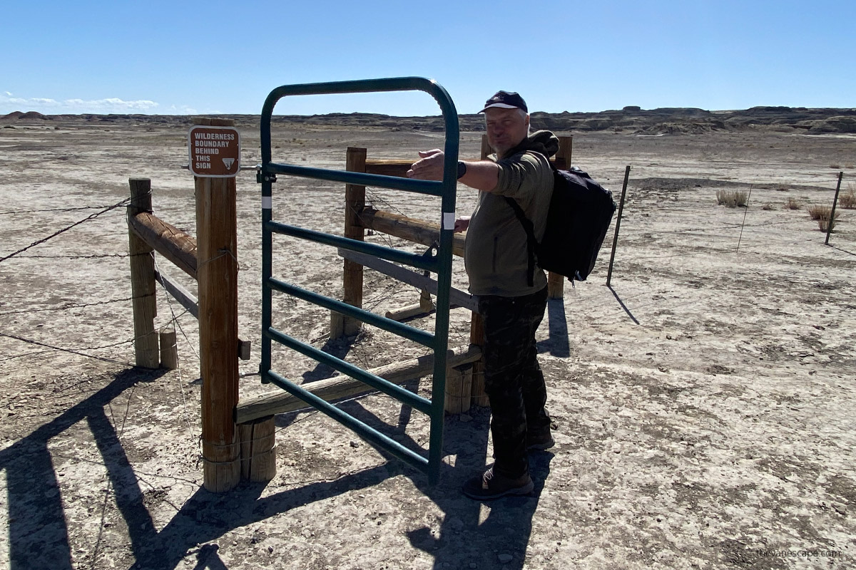 Chris next to the gate at Wilderness Boundary