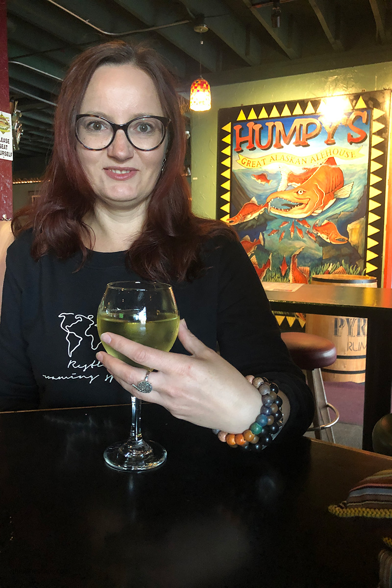 Agnes drinking wine in  Humpy's Great Alaskan Alehouse