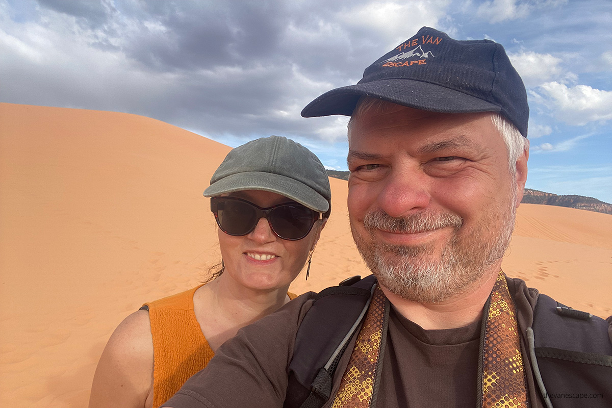 Agnes Stabinska and Chris Labanowski, the owners of the Van Escape blog, in Coral Pink Sand Dunes State Park