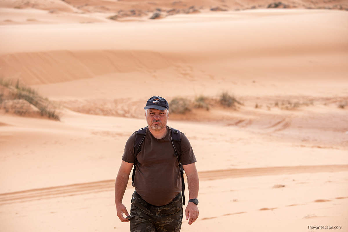 Chris hiking in Coral Pink Sand Dunes