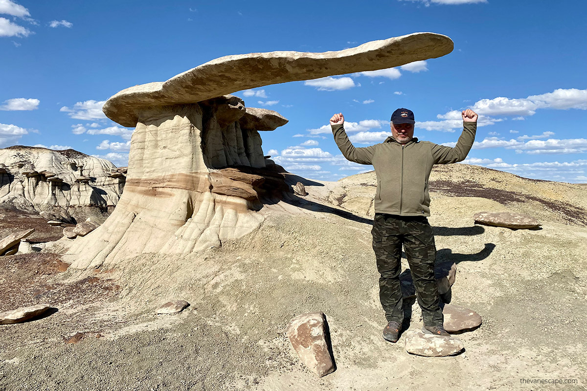 Chris Labanowski, co-owner of the Van Escape blog with the King of Wings rock formation.