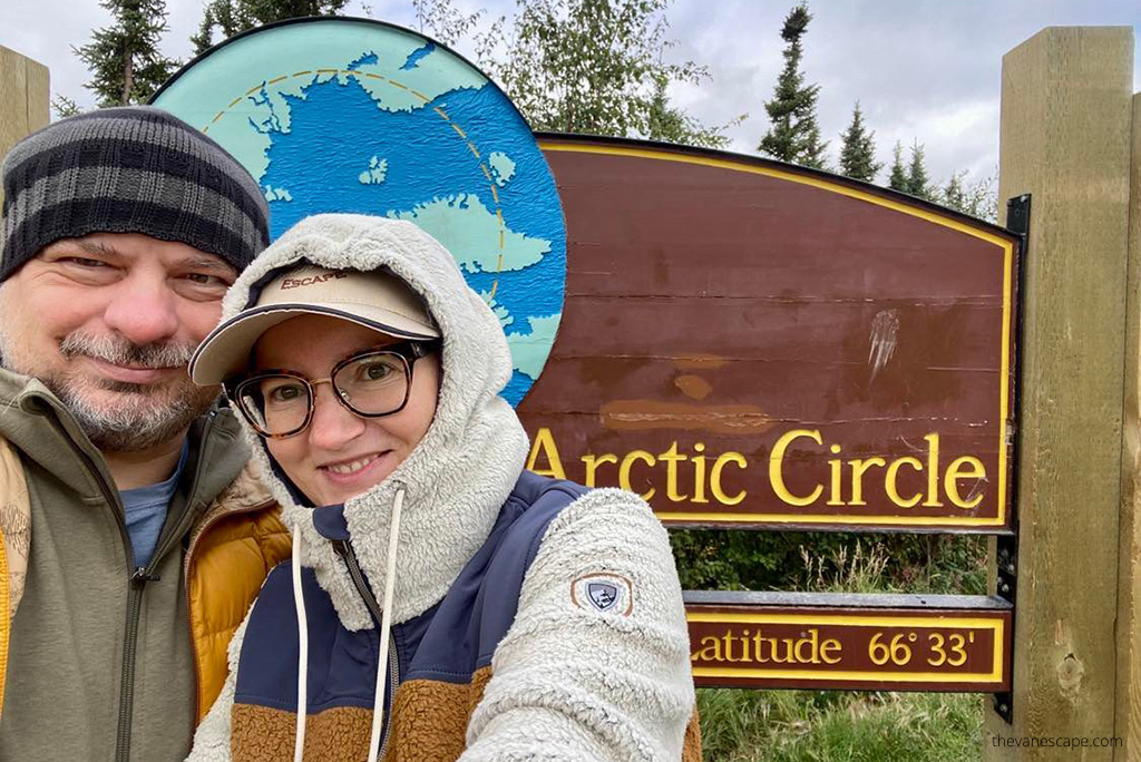 Agnes and Chris with Arctic Circle sign Alaska