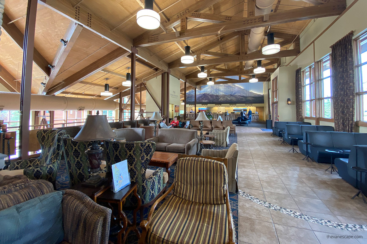 elegant interior with armchairs and tables in luxury Denali Princess Wilderness Lodge