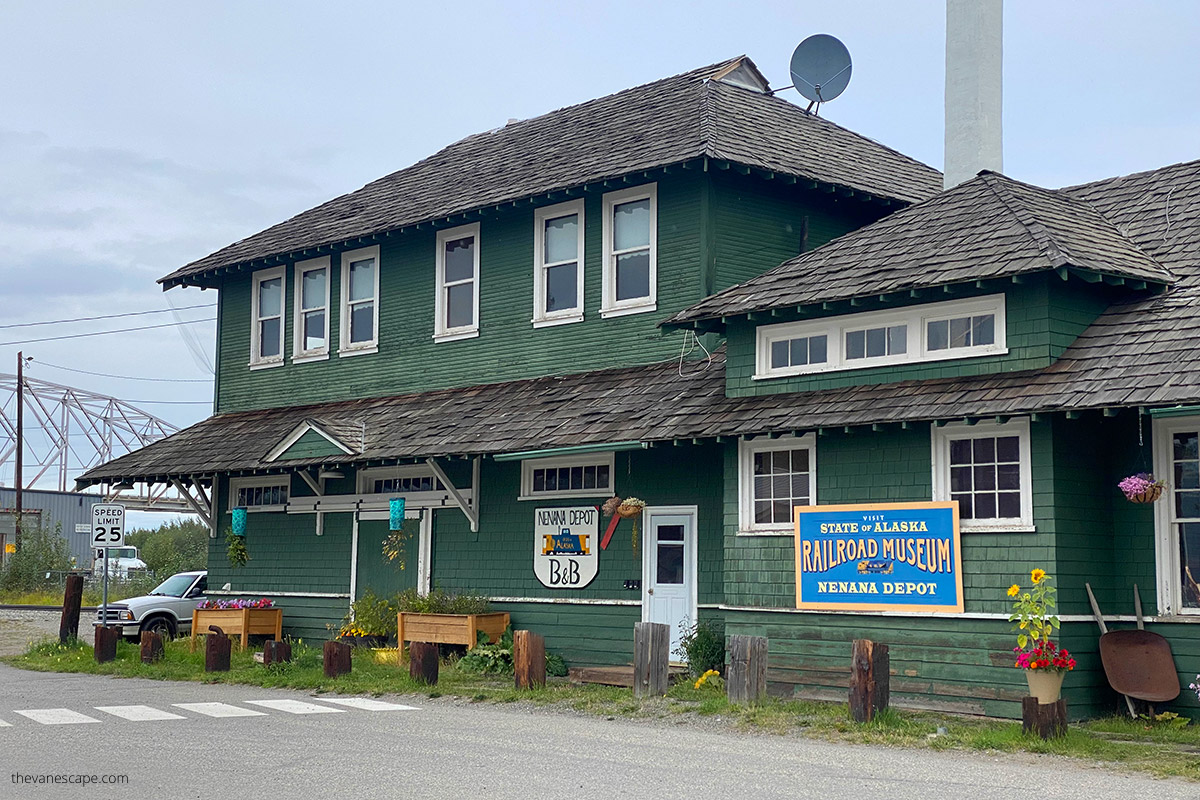 Historic green wooden building Railroad Museum and Depot in Nenana