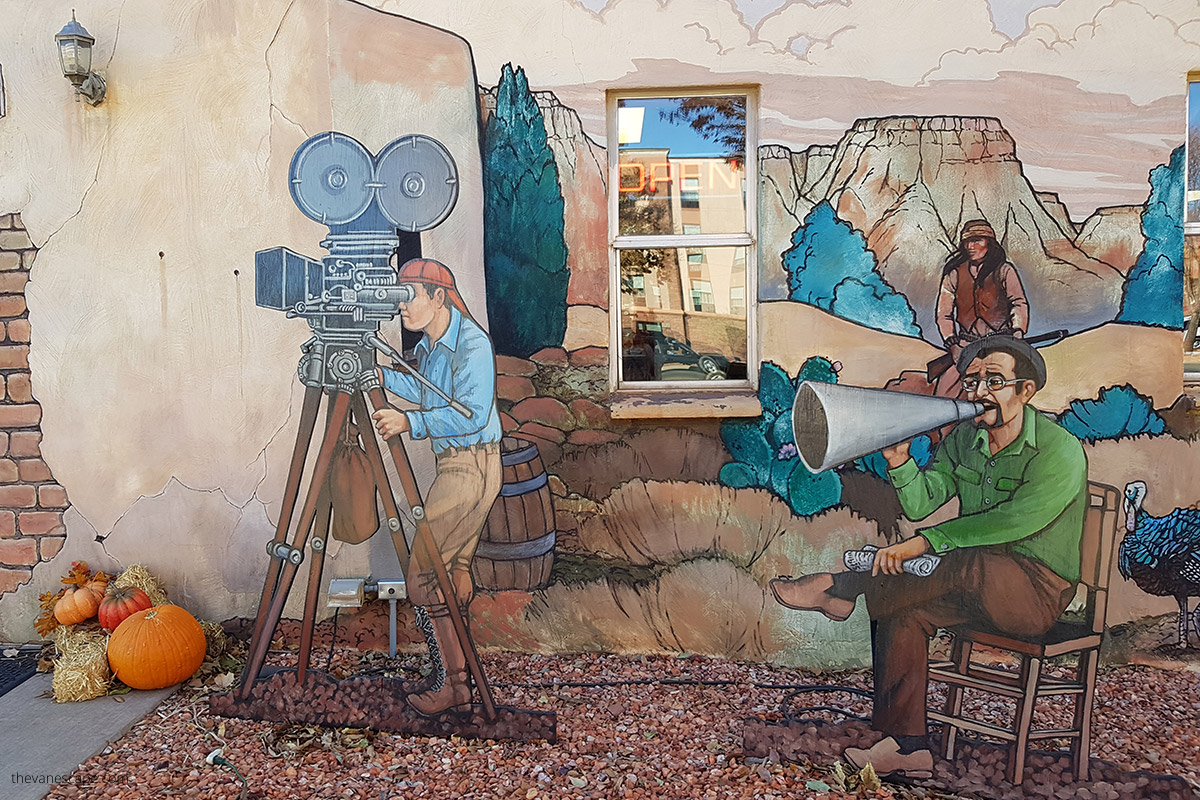 A colorful mural showing the director and cameramen shooting a western in Little Hollywood Kanab