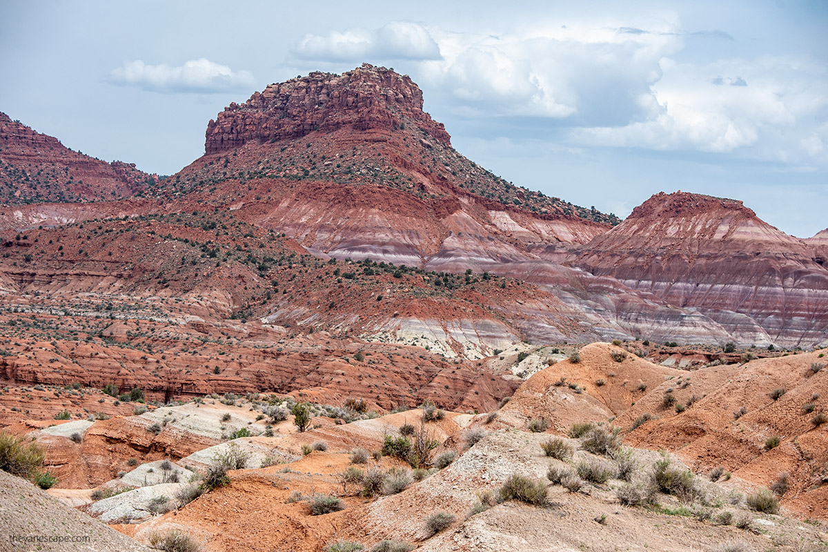Old Paria in Utah - stunning rock formations of Paria Rainbow Mountains  that have shades of rust, red, purple, purple, gray, and white