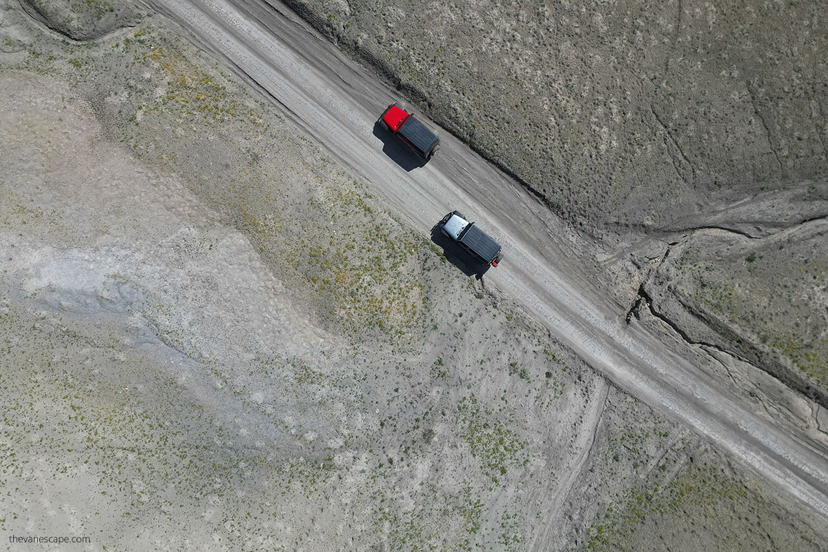 jeeps on the road view from above taken by dron