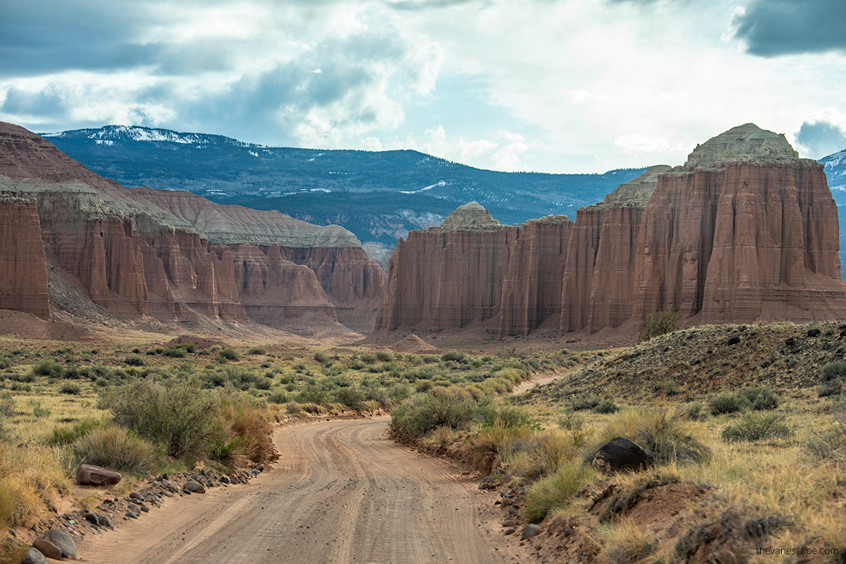 driving the cathedral valley loop - the view of the road and massive rock formations