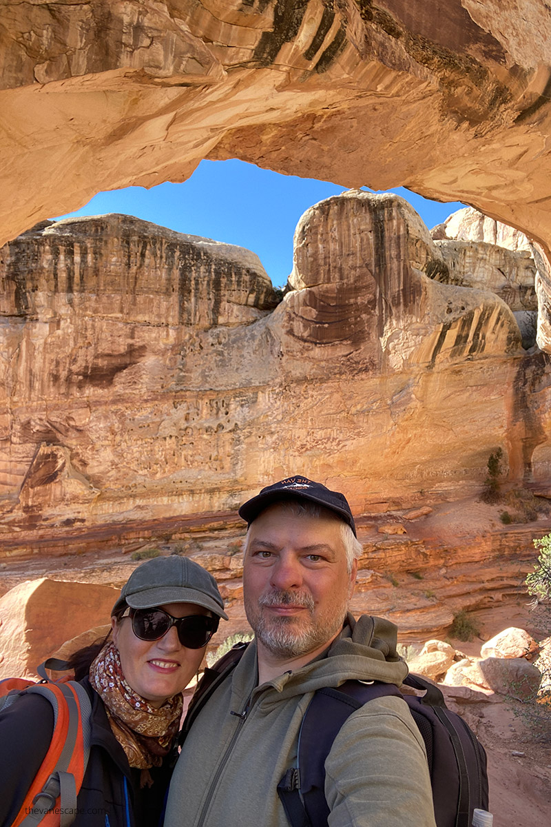 Agnes Stabinska and Chris Labanowski, the owners of The Van Escape blog, on the hike to Hickman Bridge which is a short hike perfect for one day in Capitol Reef Itinerary.