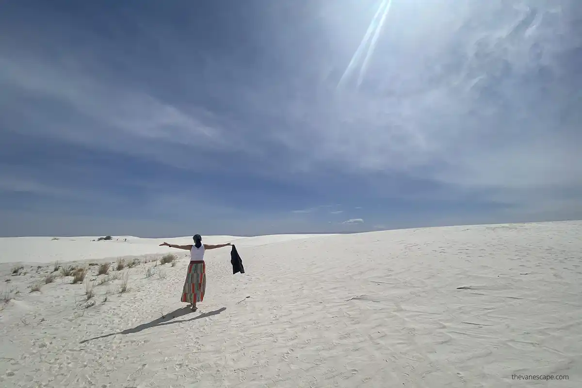 Agnes Stabinska, author, is visiting and enjoying white sands dunes during sunny spring day.