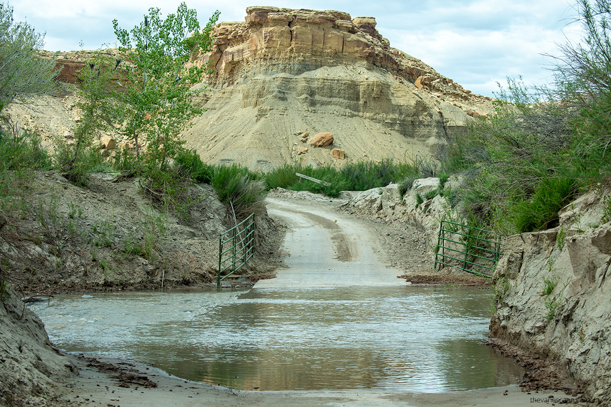 road conditions in capitol reef during spring - high water level on the road - road is impassable.