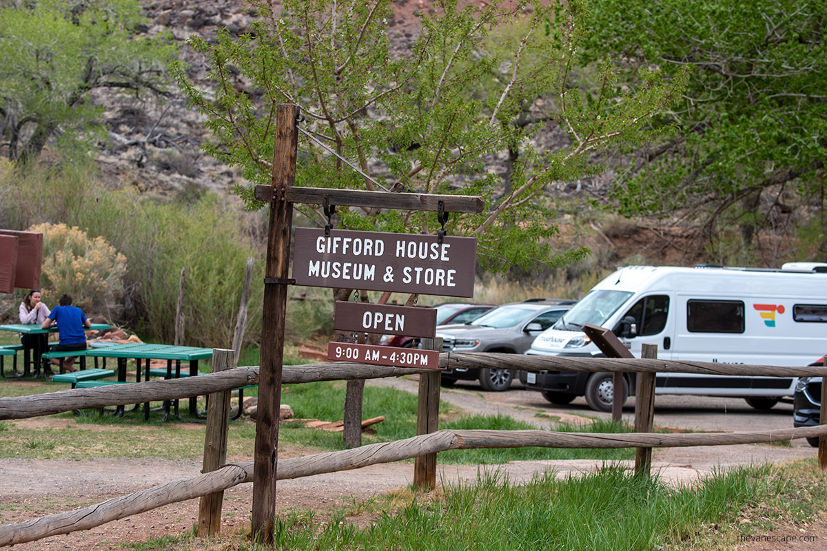 wooden sign of gifford house museum and store.