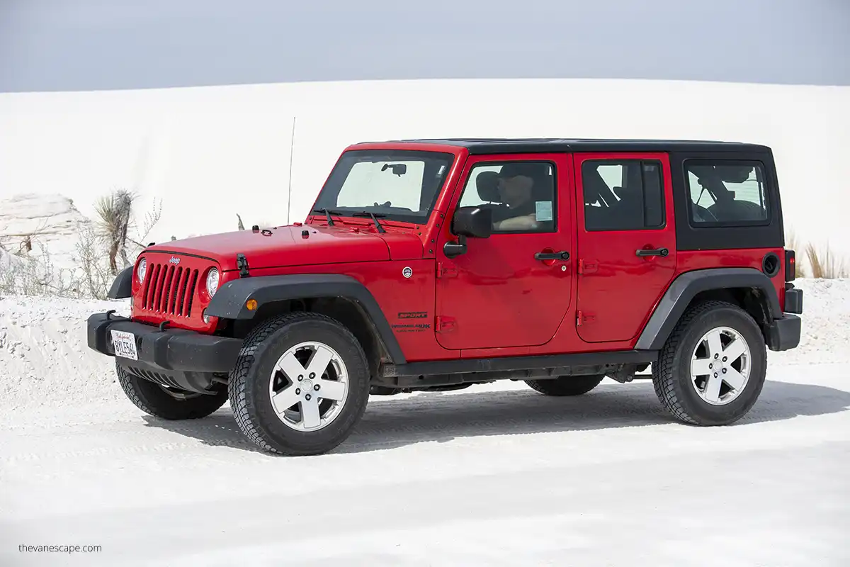 Chris driving read Jeep Wrangler on 8 miles long Dunes Drive.