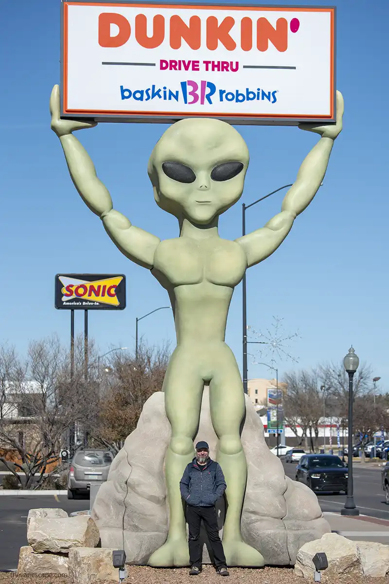 Chris with huge Alien statue neext to Dunkin Drive Thrue in Roswell. 